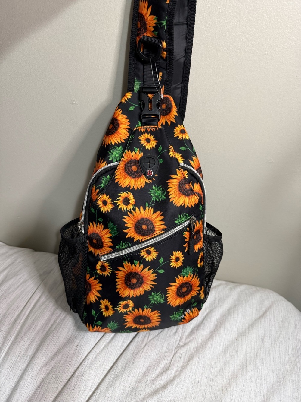 Sunflower Print Sling Backpack - Black with Orange Sunflowers